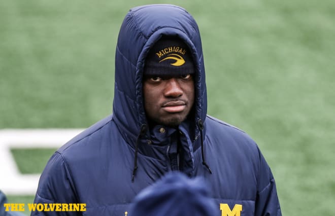 Michigan commit David Ojabo didn't look ecstatic all bundled up but he thoroughly enjoyed his time in Ann Arbor.