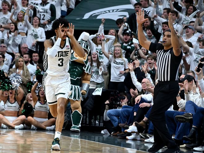 Jaden Akins celebrates with the Michigan State crowd after a making a big shot; Photo Credit: © Dale Young-USA TODAY Sports