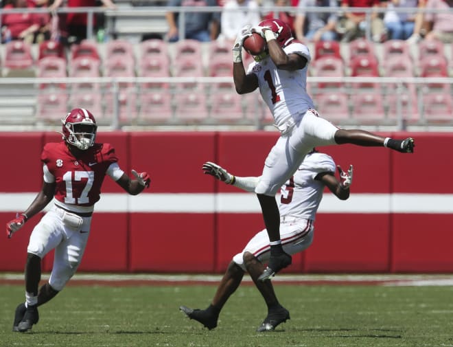 White defensive back Ga'Quincy McKinstry (1) intercepts a pass intended for Crimson wide receiver Agiye Hall (17) during the Alabama A-Day game at Bryant-Denny Stadium. Photo | Imagn