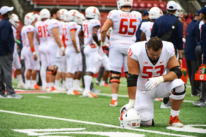 PISCATAWAY, NJ - OCTOBER 06: Nick Allegretti #53 of the Illinois Fighting Illini prays before the game against the Rutgers Scarlet Knights at HighPoint.com Stadium on October 6, 2018 in Piscataway, New Jersey.