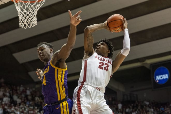 Alabama Crimson Tide forward Nick Pringle (23) shoots the ball against LSU Tigers center Kendal Coleman (4) during the second half at Coleman Coliseum. Photo | Marvin Gentry-USA TODAY Sports