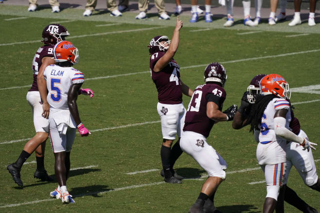 Seth Small (47) kicks the game winning field goal.