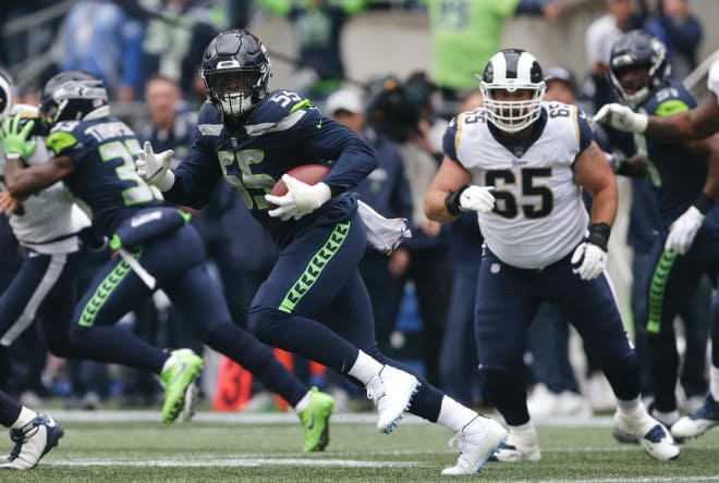 Former U-M defensive end Frank Clark recorded his first career interception in Sunday’s 33-31 loss the Los Angeles Rams.