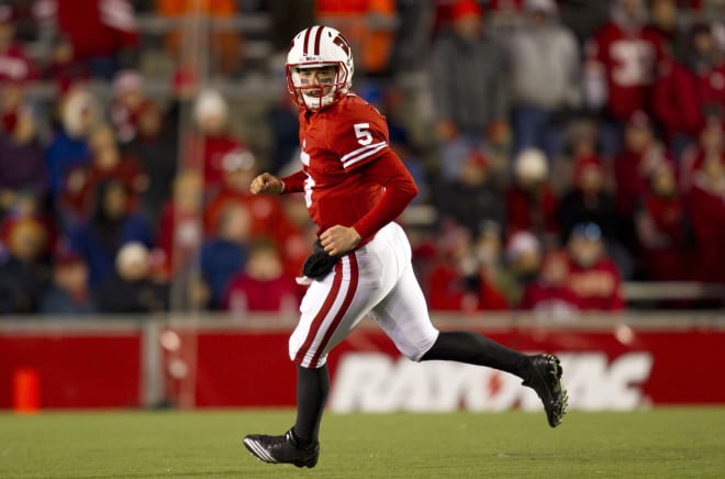 Wisconsin Badgers quarterback Jon Budmayr (5) during the game against the Northwestern Wildcats at Camp Randall Stadium. Wisconsin defeated Northwestern 70-23.