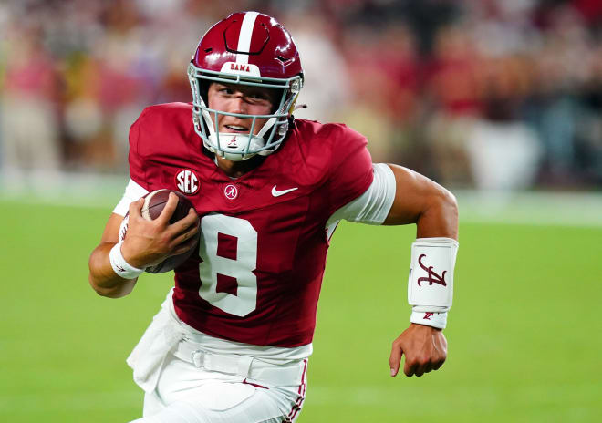 Alabama Crimson Tide quarterback Tyler Buchner (8) scrambles up the field against the Middle Tennessee Blue Raiders during the second half at Bryant-Denny Stadium. Photo |  John David Mercer-USA TODAY Sports