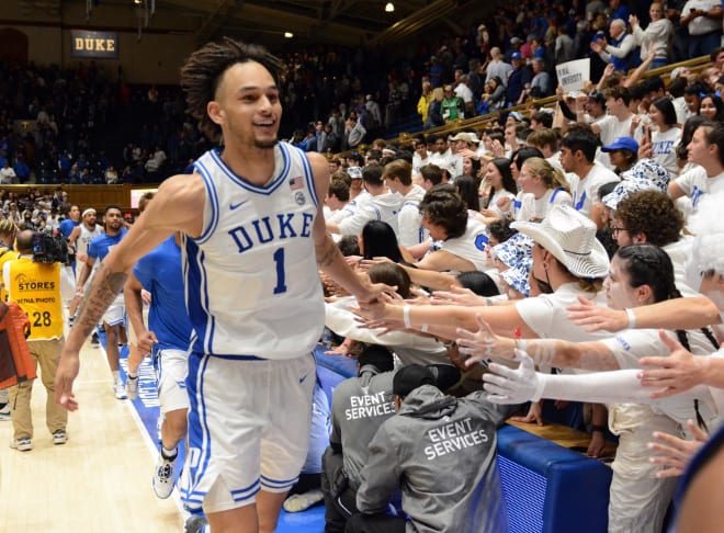 Dereck Lively II celebrates with fans after Wednesday night's win over Ohio State. 