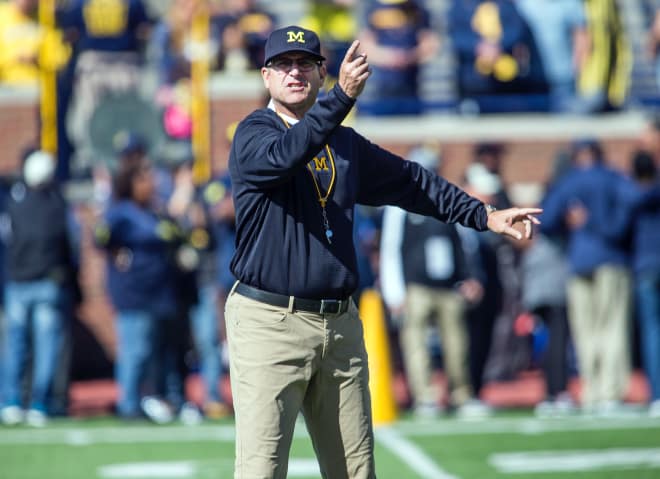 Michigan head coach Jim Harbaugh checked in on top recruits this week. 