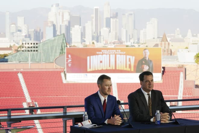 New USC football coach Lincoln Riley with athletic director Mike Bohn on Monday inside the Coliseum.