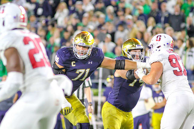 Alex Bars (71) suffered what looks to be a major knee injury in the third quarter during the victory versus Stanford.