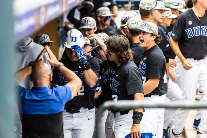 Duke's dugout celebrates during a game against Miami in the ACC tournament. 
