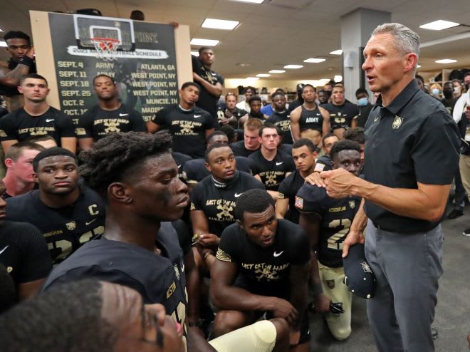 Head Coach Jeff Monken addresses his team after their victory on Saturday