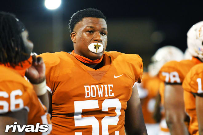 5-star OL Devon Campbell is a top priority target for Texas.
