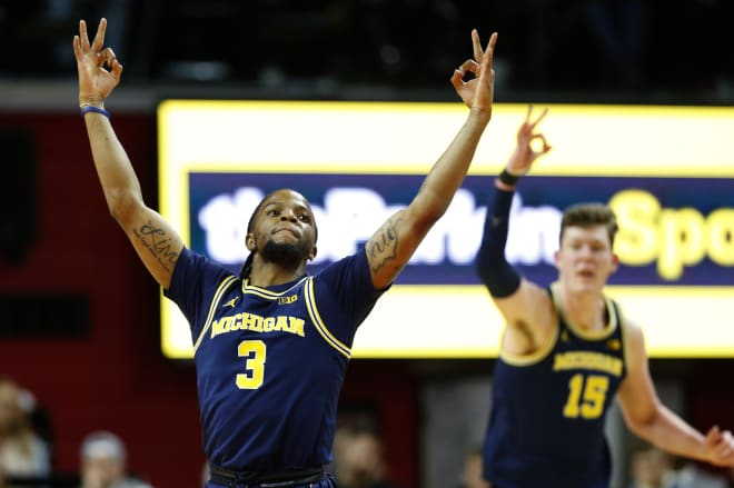 Senior point guard Zavier Simpson eclipsed the 1,000-point mark and had many reasons to exult.