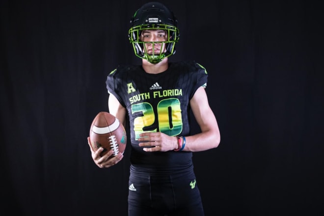 Rodemaker poses in USF gear during his visit this spring