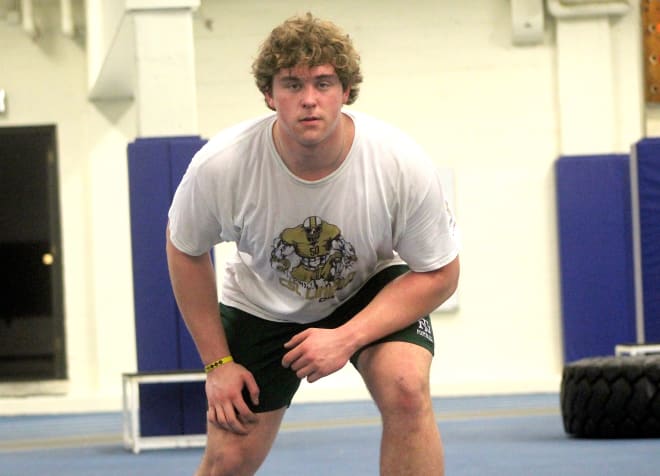 Four-star offensive lineman David Davidkov has committed to the Iowa Hawkeyes.
