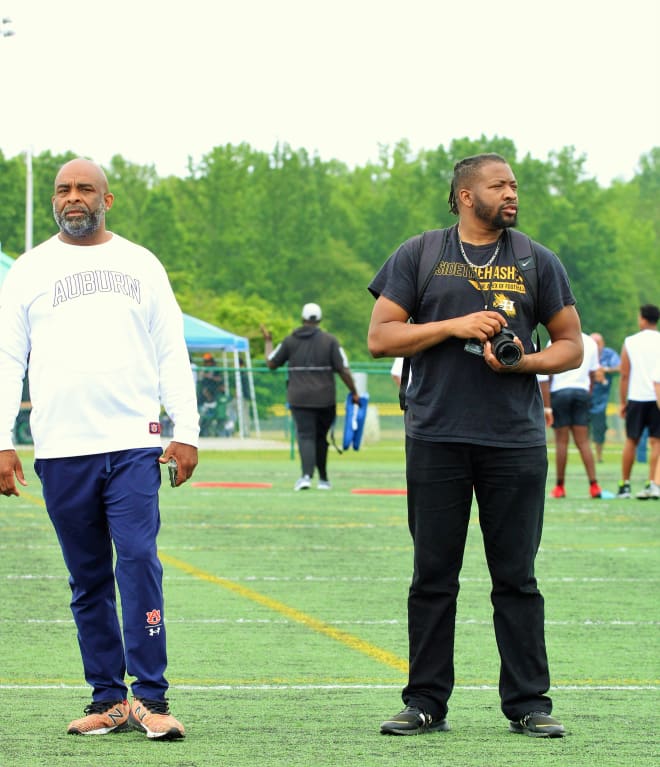 L-R Kenyatta Watson and Jerome Jones of Inside the Hashes observing athletes competing. (Dale Dowden/VolReport.com)
