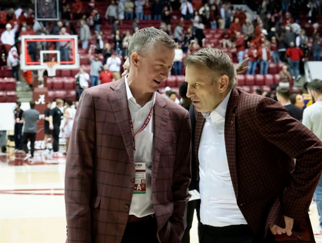 Athletic Director Greg Byrne talks to Alabama head coach Nate Oats after the Crimson Tide's win over LSU at Coleman Coliseum Saturday.  Photo | Gary Cosby Jr.-Tuscaloosa News / USA TODAY NETWORK