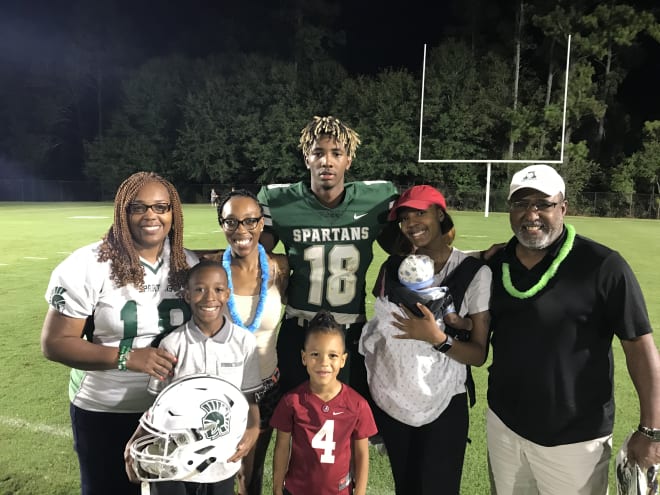 Athens (Ga.) Academy wide receiver and Notre Dame commit Deion Colzie with his family