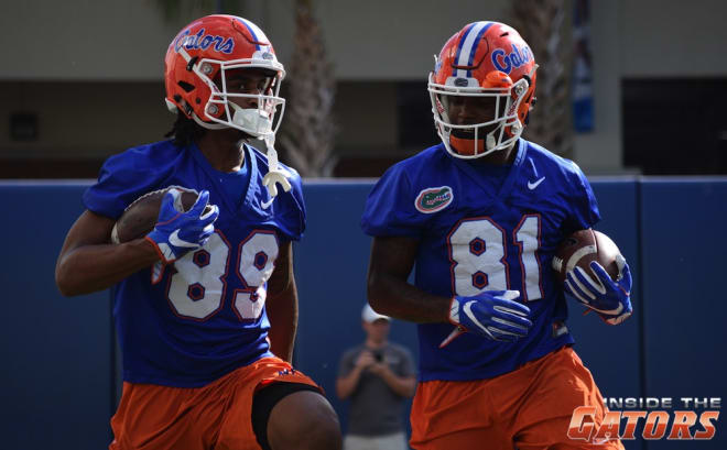 Wide receivers Tyrie Cleveland (89) and Antonio Callaway (81)