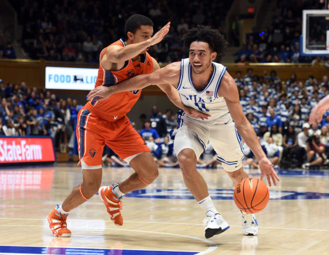 Duke's Jared McCain, right, drives against Bucknell's Brandon McCreesh on Friday night. 