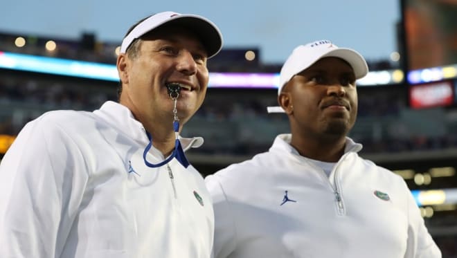 Florida coach Dan Mullen (left) and offensive coordinator Brian Johnson. 