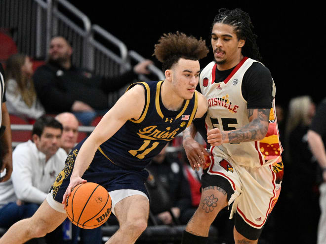 Notre Dame freshman guard Braeden Shrewsberry, left, led the Irish with 23 points in a 72-50 victory at Louisville.