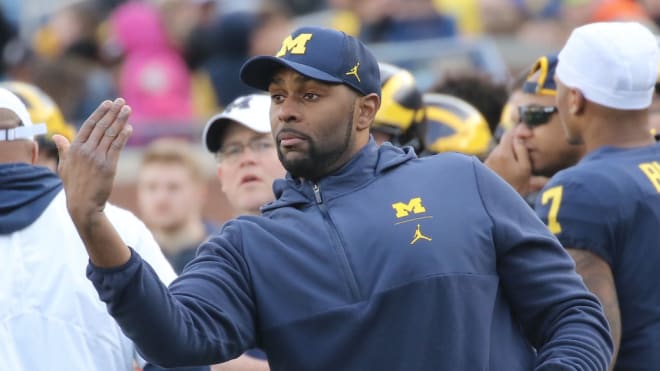 Michigan Wolverines football offensive line coach/co-coordinator Sherrone Moore is 