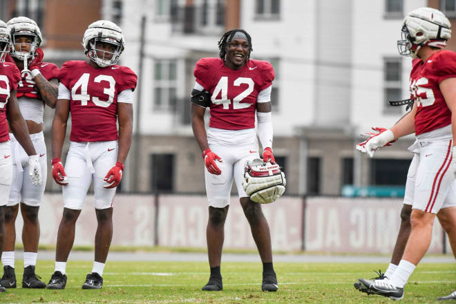 Outside linebacker Yhonzae Pierre (42) laughs with teammates during practice at the University Alabama Thursday. Photo | Gary Cosby Jr.-Tuscaloosa News / USA TODAY NETWORK