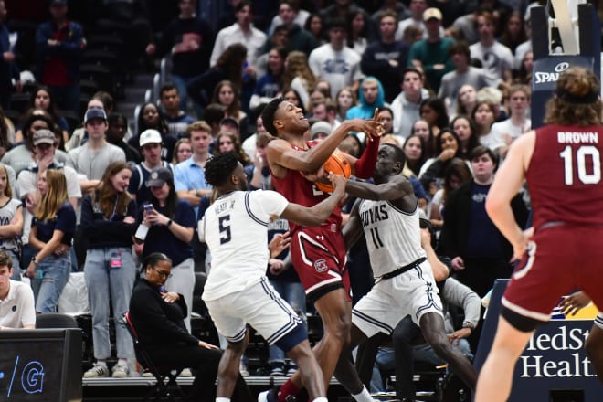 Despite being a source of defensive focus, GG Jackson, here being stripped by Akok Akok, feasted. during second half play. 