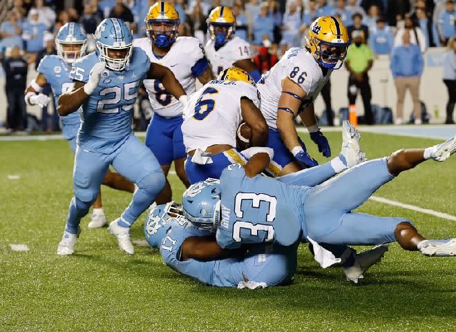 UNC LB Cedric Gray (33) has recorded 137 tackles this season for the Tar Heels.