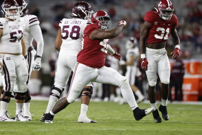 Alabama defensive lineman Phidarian Mathis celebrates a sack against Mississippi State. Photo | SEC 