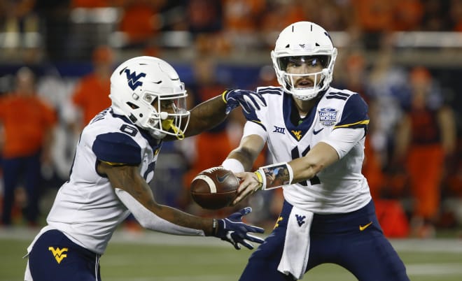 Jack Allison (11) seemed to be the heir apparent under center for the Mountaineers after Will Grier went to the NFL. Plans changed after Neal Brown became head coach in 2019, and Allison left the program after Brown's first season.