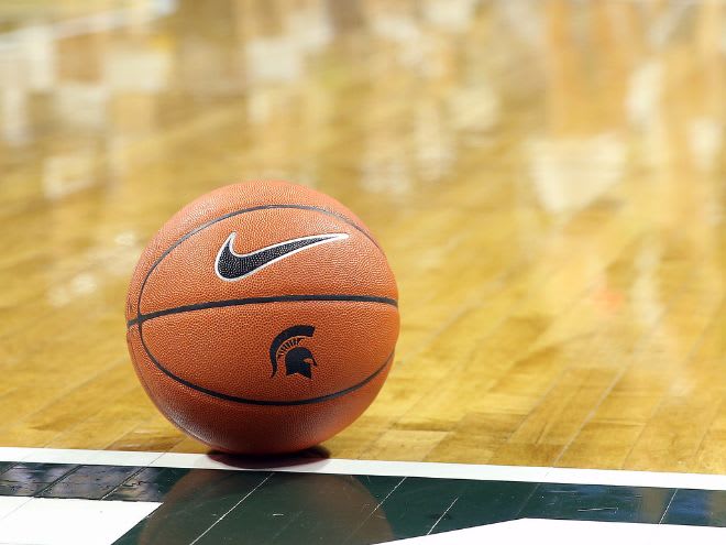 A Michigan State basketball sits at the Breslin Center 