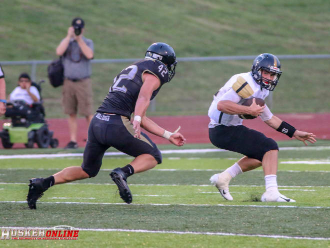 Nebraska linebacker commit Nick Henrich closes in on the Lincoln Southeast quarterback for a sack Friday night.