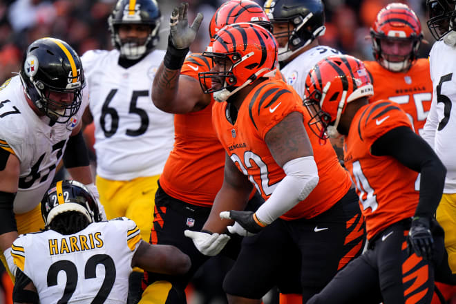 Former NC State defensive lineman B.J. Hill had four tackles and a sack for the Cincinnati Bengals during a big win over the Pittsburgh Steelers on Sunday.