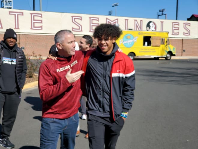 Elite 2024 QB Jadyn Davis is greeted by FSU coach Mike Norvell on Saturday.