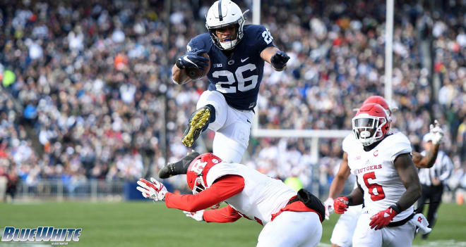 Penn State Nittany Lions football running back Saquon Barkley hurdles a defender against Rutgers. 