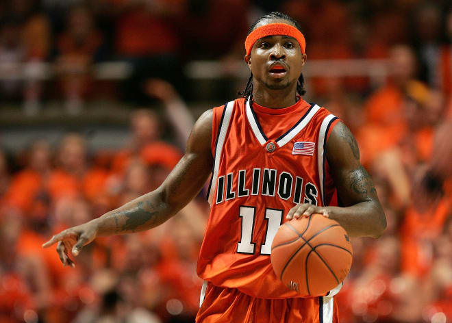 Dee Brown #11 of the Illinois Fighting Illini brings the ball upcourt on his way to a career high 34 points against the Michigan State Spartans on January 5, 2006 in the Assembly Hall at the University of Illinois in Champaign, Illinois.