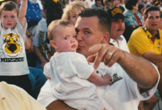 Mizzou was in Drew's blood.  Here, he attends his first Mizzou game at nine months old with his father.