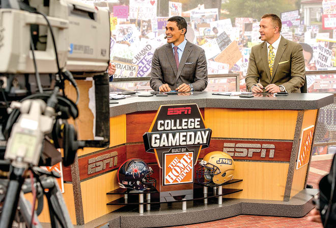 ESPN analysts David Pollack (left) and Kirk Herbstreit are shown on the set of College GameDay on Oct. 24, 2015 at James Madison University in Harrisonburg.