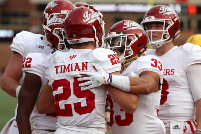 Former Indiana wide receiver Luke Timian (25) is congratulated after catching a second quarter touchdown pass against the Maryland Terrapins at Maryland Stadium during the 2017 season. That year was the last time the Hoosiers had names on the back of their uniforms, but that is now changing this fall. 