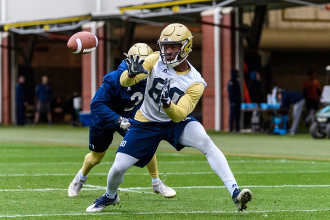 Camp hauls in a pass during spring drills