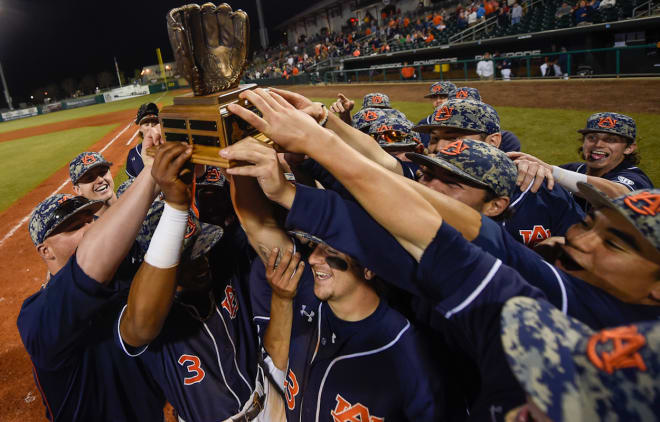 Auburn players celebrate their 7th win in the Capital City Classic.