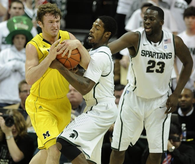 Former Michigan Wolverines basketball captain Zack Novak helped will U-M to victory at MSU in a program-changing moment.