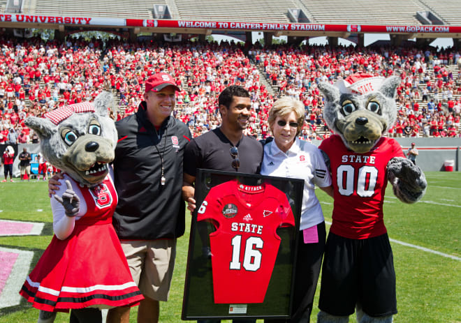 Super-Bowl winning quarterback Russell Wilson's No. 16 is honored by NC State Wolfpack football. 