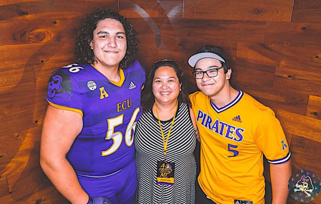 IMG center Ethan Lang pictured with his mother and brother on his recent visit to East Carolina.