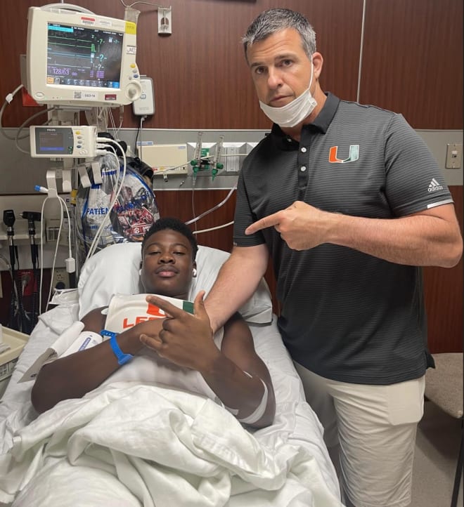 Shortly after arriving at the hospital with a broken leg suffered at Legends Camp, coach Mario Cristobal arrived to console and give Koby Howard an offer