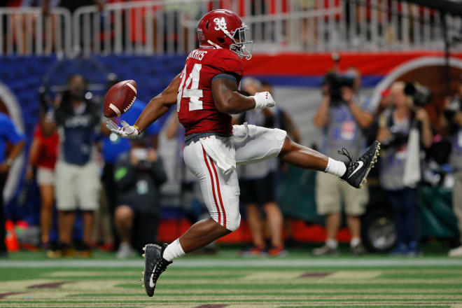 Alabama running back Damien Harris celebrates after scoring a touchdown against Florida State. Photo | Getty Images