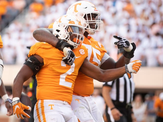 Tennessee offensive lineman Jerome Carvin and running back Jabari Small celebrate the Vols 38-33 win over Florida on Sept. 24 at Neyland Stadium. 