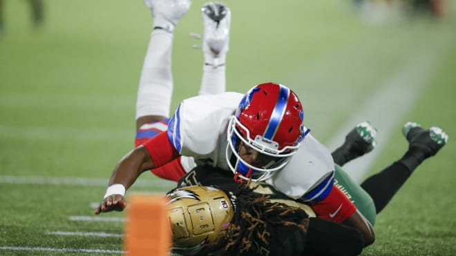 Duncanville's Elijah Wilson makes a tackle during the 2021 season.